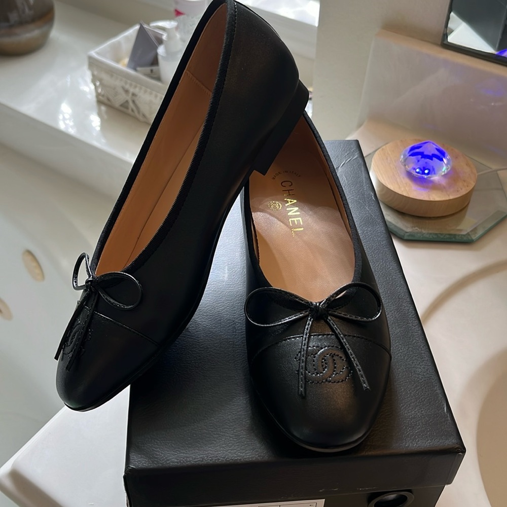 Designer inspired black ballet flats. Size 7. Brand new